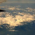 Szczyty gór nad chmurami #góry #lot #chmury #samolot #widok
